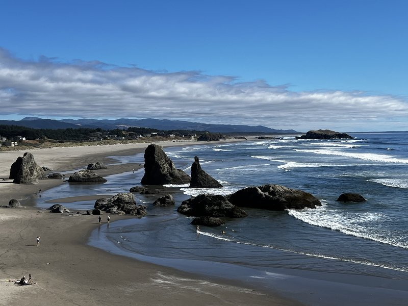 Sea stacks scattered across the surf along the Oregon coast
