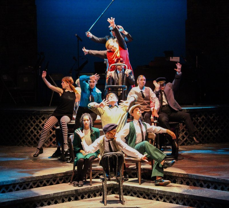 The young cast of Twelfth Night posed in a tableau on the Playhouse stage