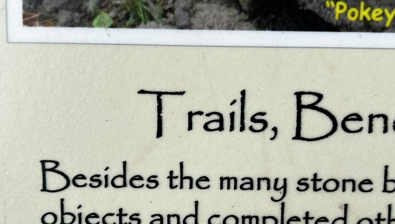 A close-up of the park sign set in Papyrus with dreadful kerning
