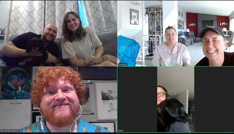 A four-way video call grid for family movie club: Alex and Kelsie on the couch with a puppy, Kaylee and Justin in the living room with Jody holding an ice pack, Spencer grinning in his blue shirt, and Corey snuggling Lyra