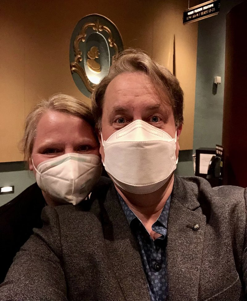 Jody and Justin in masks, taking a selfie in the NorShor Theatre on opening night of Spamalot