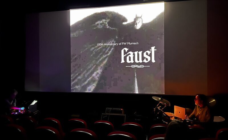 ten thousand lakes performing their live score beneath the screen during Faust at the Zinema