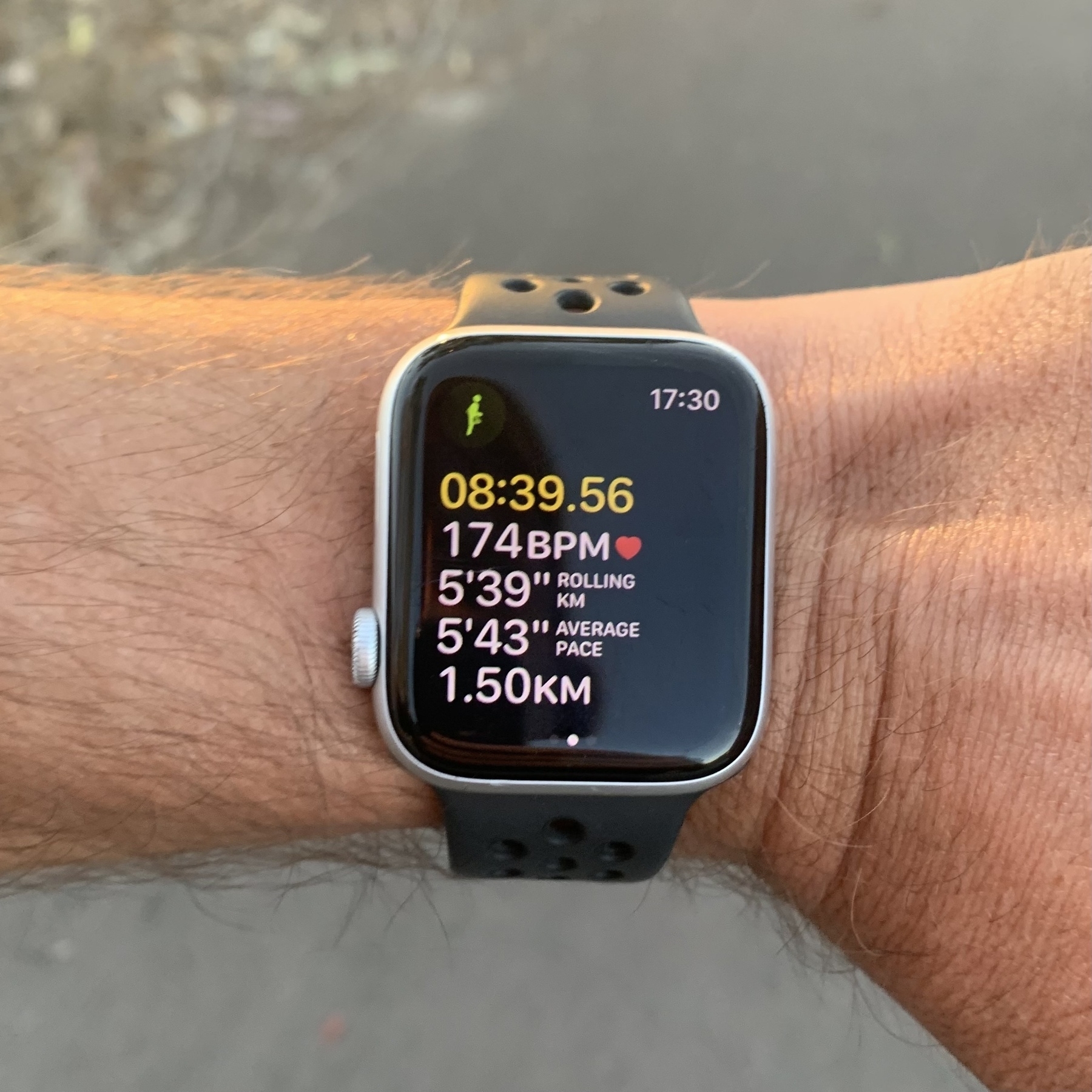 Action photo of my Apple Watch during a run showing a heart rate of 174bpm