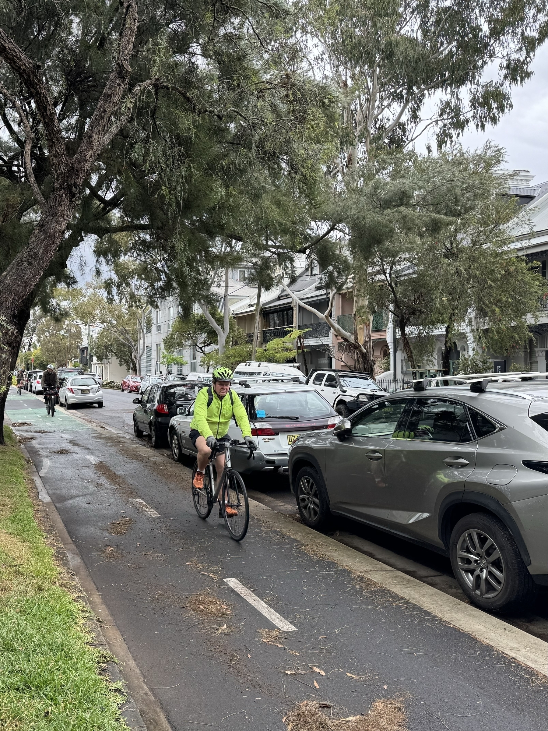 Cyclists riding along the bike path towards Redfern station