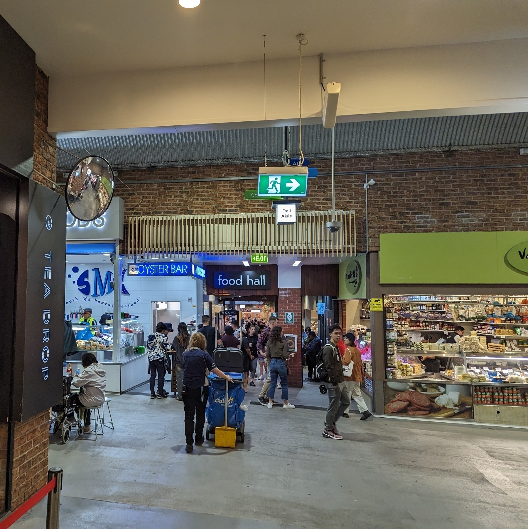 Entrance to the food hall, with a fish seller on the left.