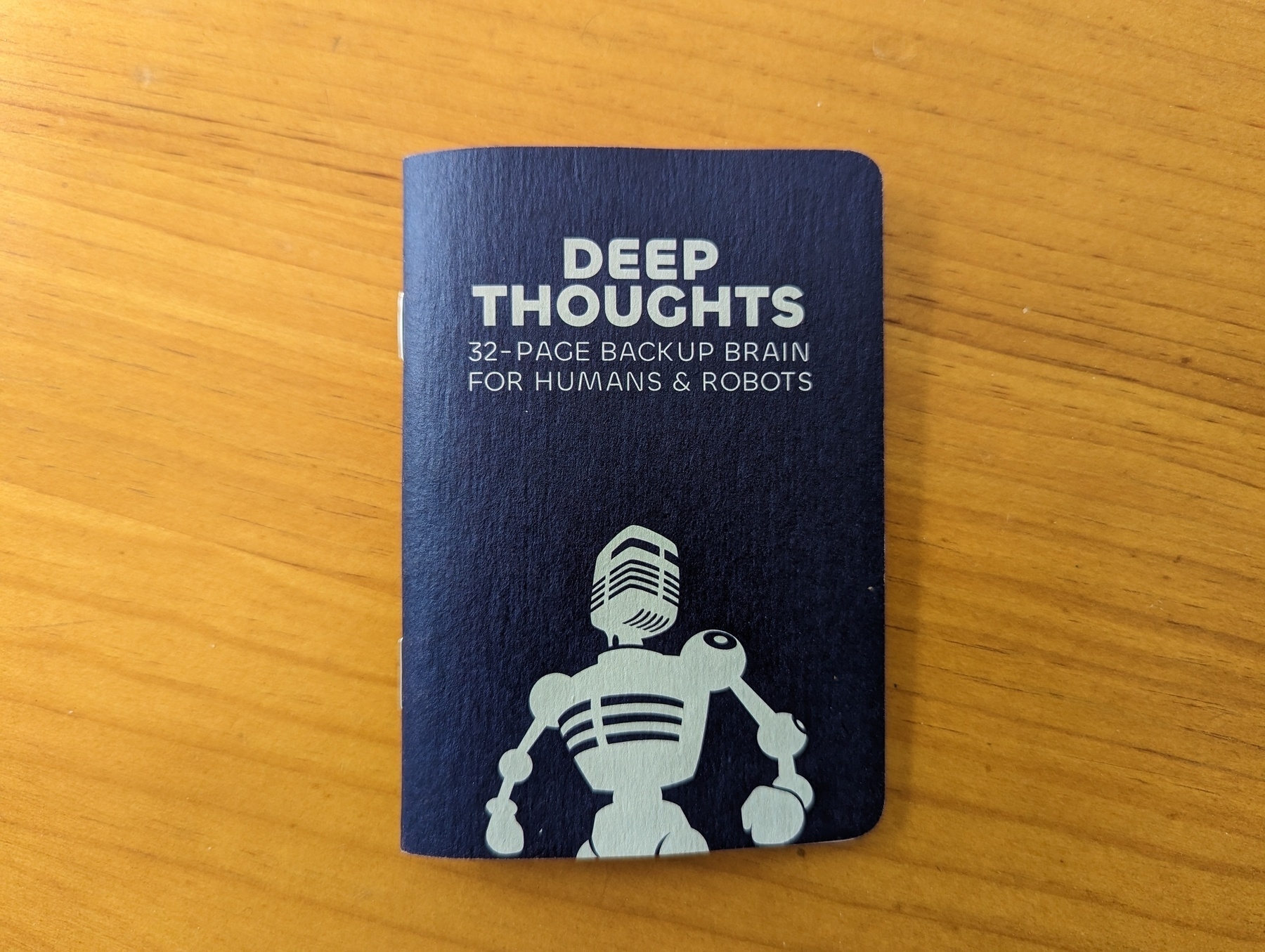 Front of notebook with the Incomparable logo and the title 'Deep Thoughts' on the cover