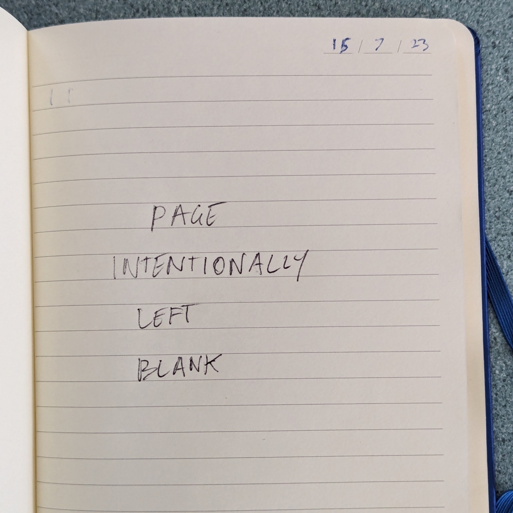 Page from a journal with a hand written date of 15 July 2023 in the top left in blue, and in the centre in all-caps, the handwritten phrase 'Page Intentionally Left Blank'