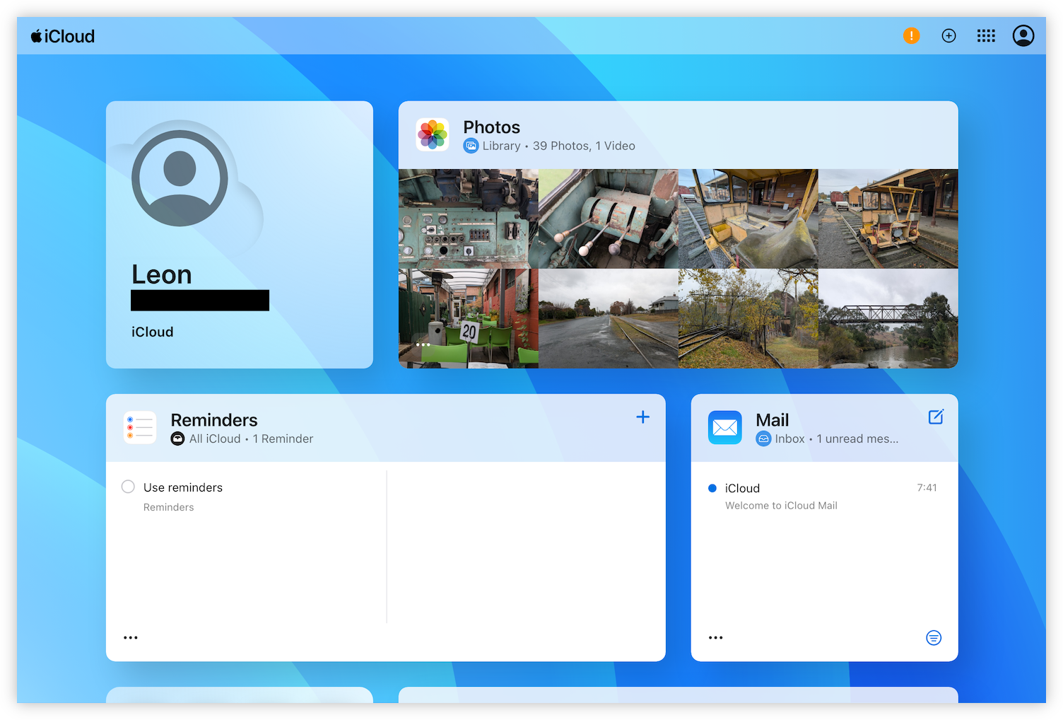 Auto-generated description: A digital dashboard displays sections for Photos, Reminders, and Mail, along with a user profile labeled Leon.