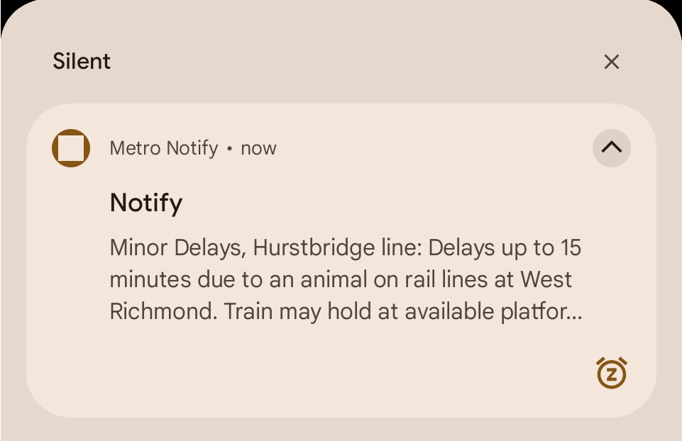 A notification from Metro Notify alerts about a delay on the Hurstbridge line due to an animal on the tracks at West Richmond.