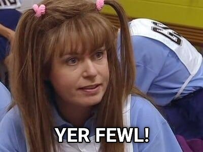 Auto-generated description: Kim from Kath and Kim with long brown hair and pink hair ties gazes ahead, with the text YER FEWL! over the image.