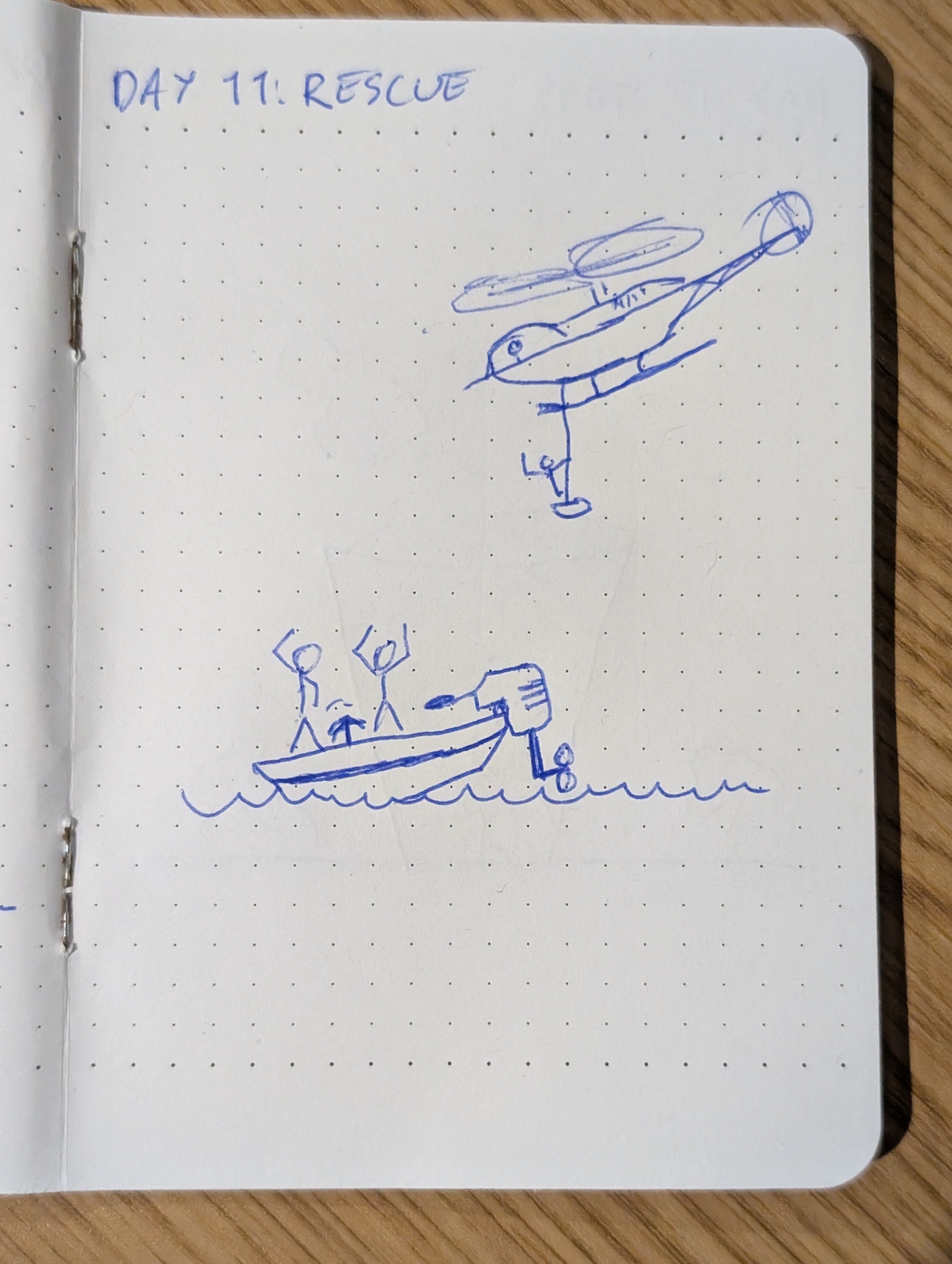 A hand-drawn sketch shows a helicopter performing a rescue operation lifting two people from a boat in the water.