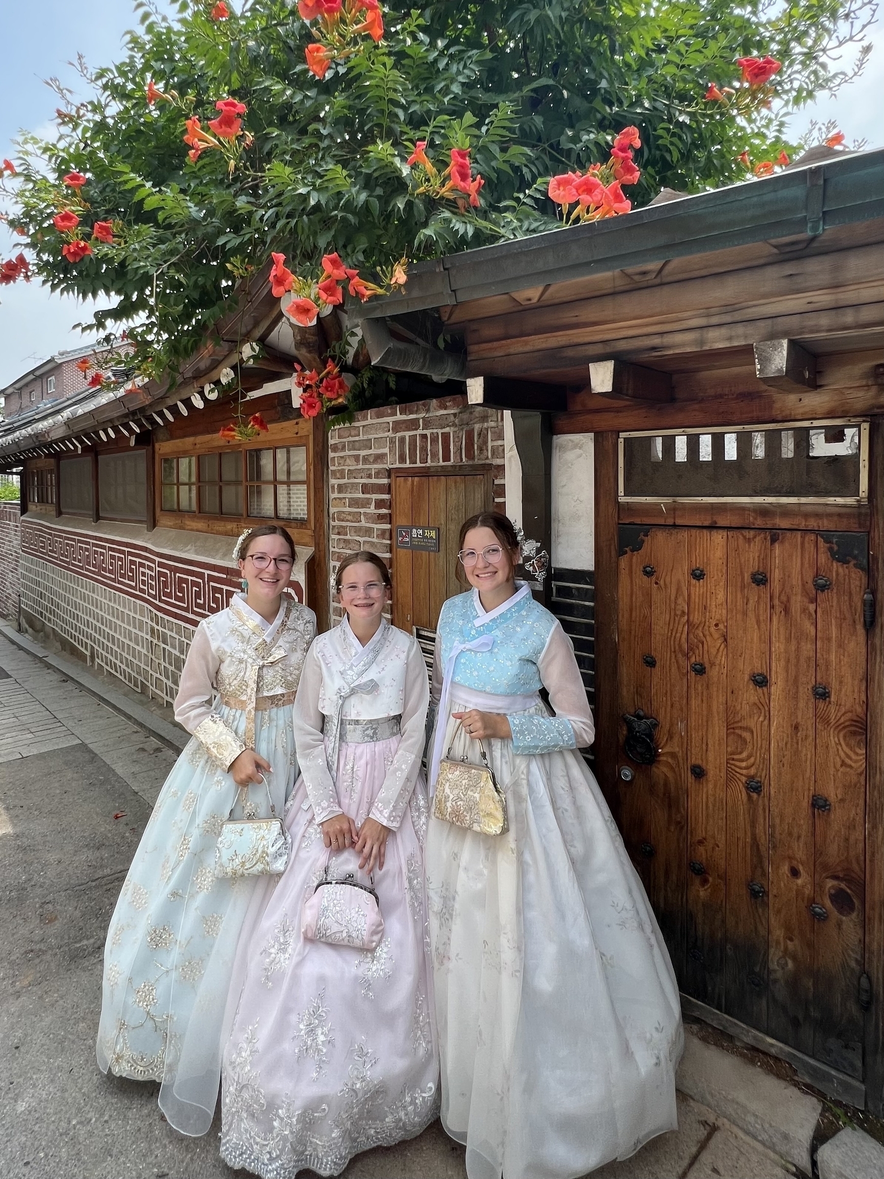 My daughters in Bukchon Village wearing hanbok.