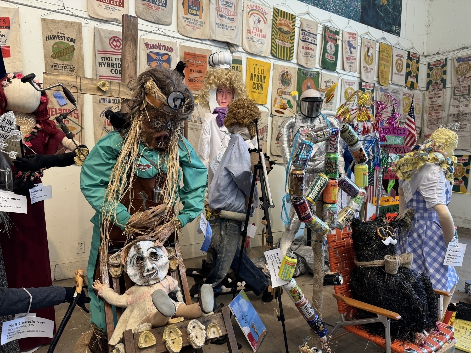 a series of distrubing scarecrows competing for ribbons at the Horticulture building