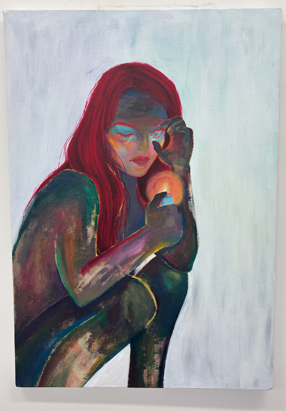 A colorful painting depicts a person with red hair striking a match, surrounded by vibrant and expressive brushstrokes.