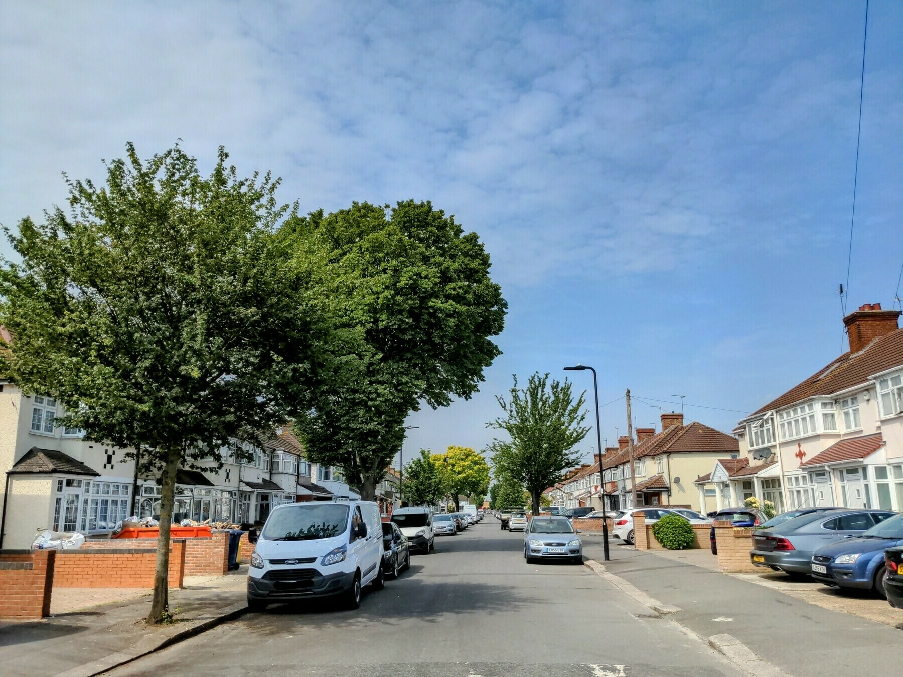 Photo of trees lining a local street in Southall Green, on a very warm Sunday morning 