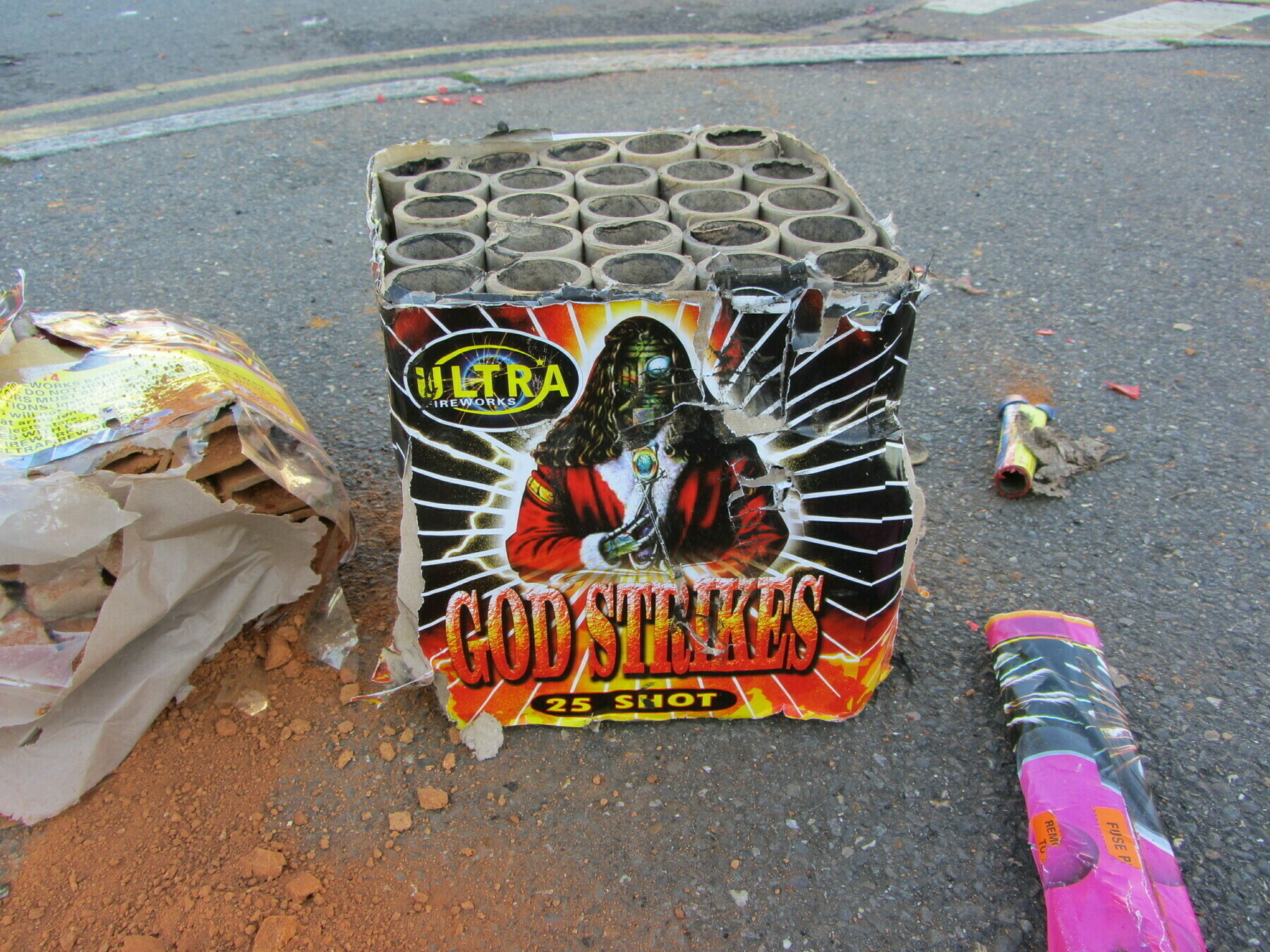 Colourful empty "Godstrikes" fireworks case.