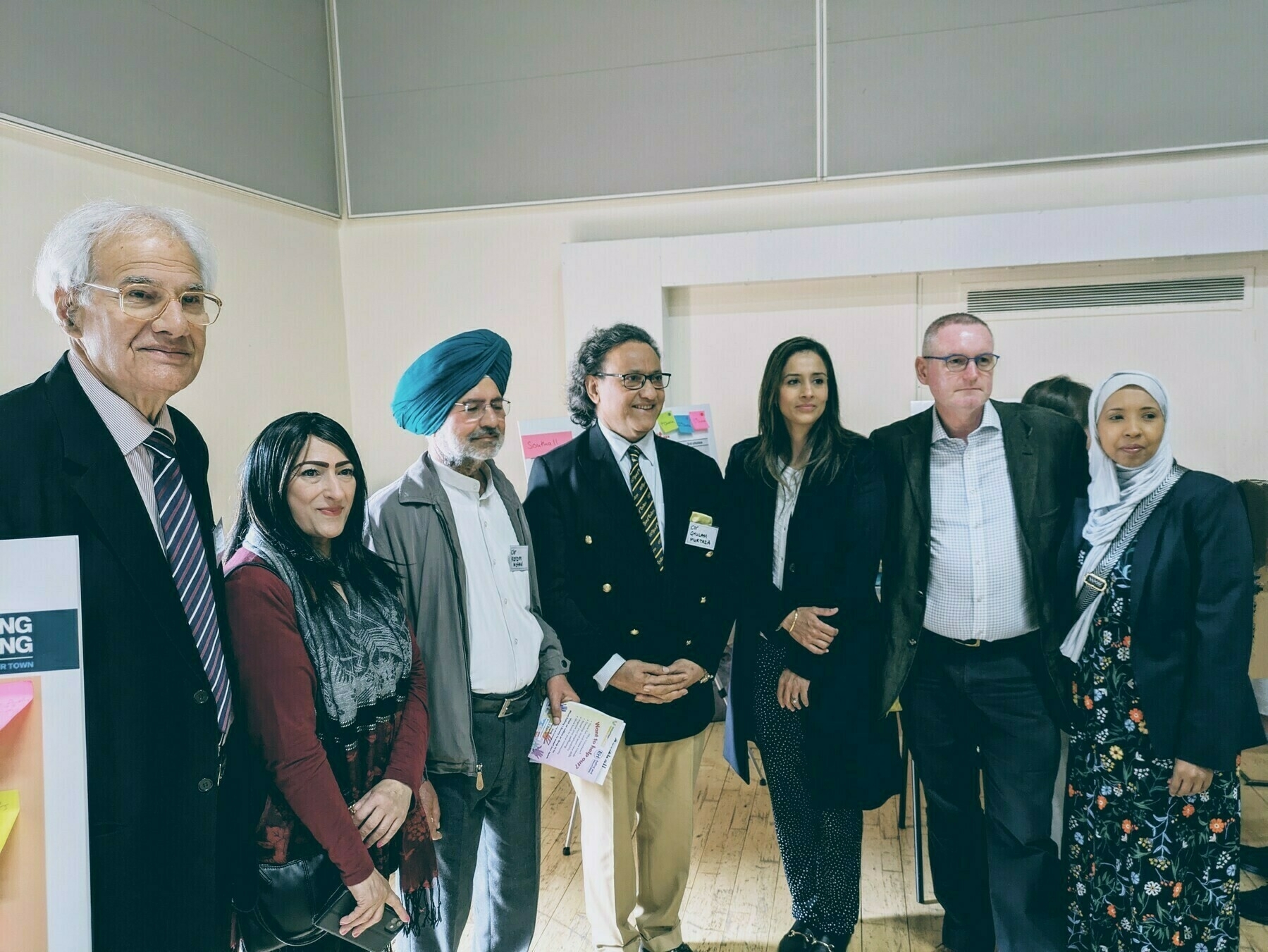 Photo of local councillors at community survey event in Southall Dominion Centre