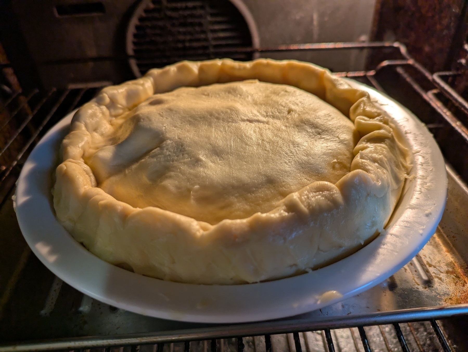 Cheese and onion pie going in the oven