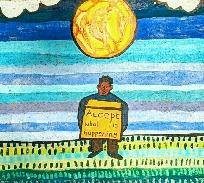 Auto-generated description: A person stands in a colorful, abstract landscape holding a sign that reads Accept what is happening under a bright sun.