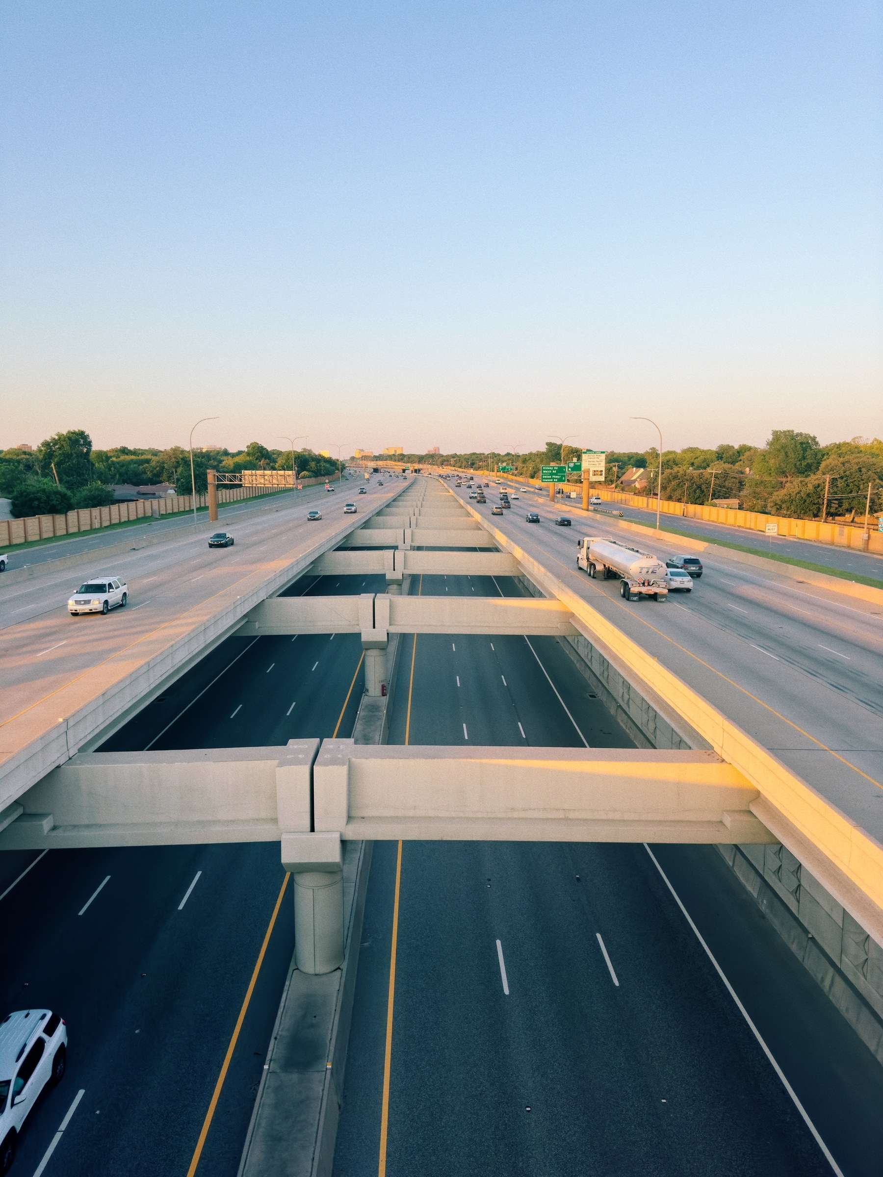 Looking east along Lyndon B Johnson Fwy on top of the pedestrian bridge that spans from the corner of Morningstar Ln and Templeton Trl in Farmers Branch, to High Meadow Dr and Cromwell Dr in Dallas.