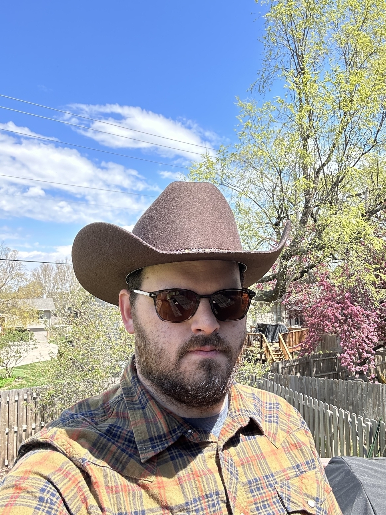 Portrait in a new Justin cowboy hat. 