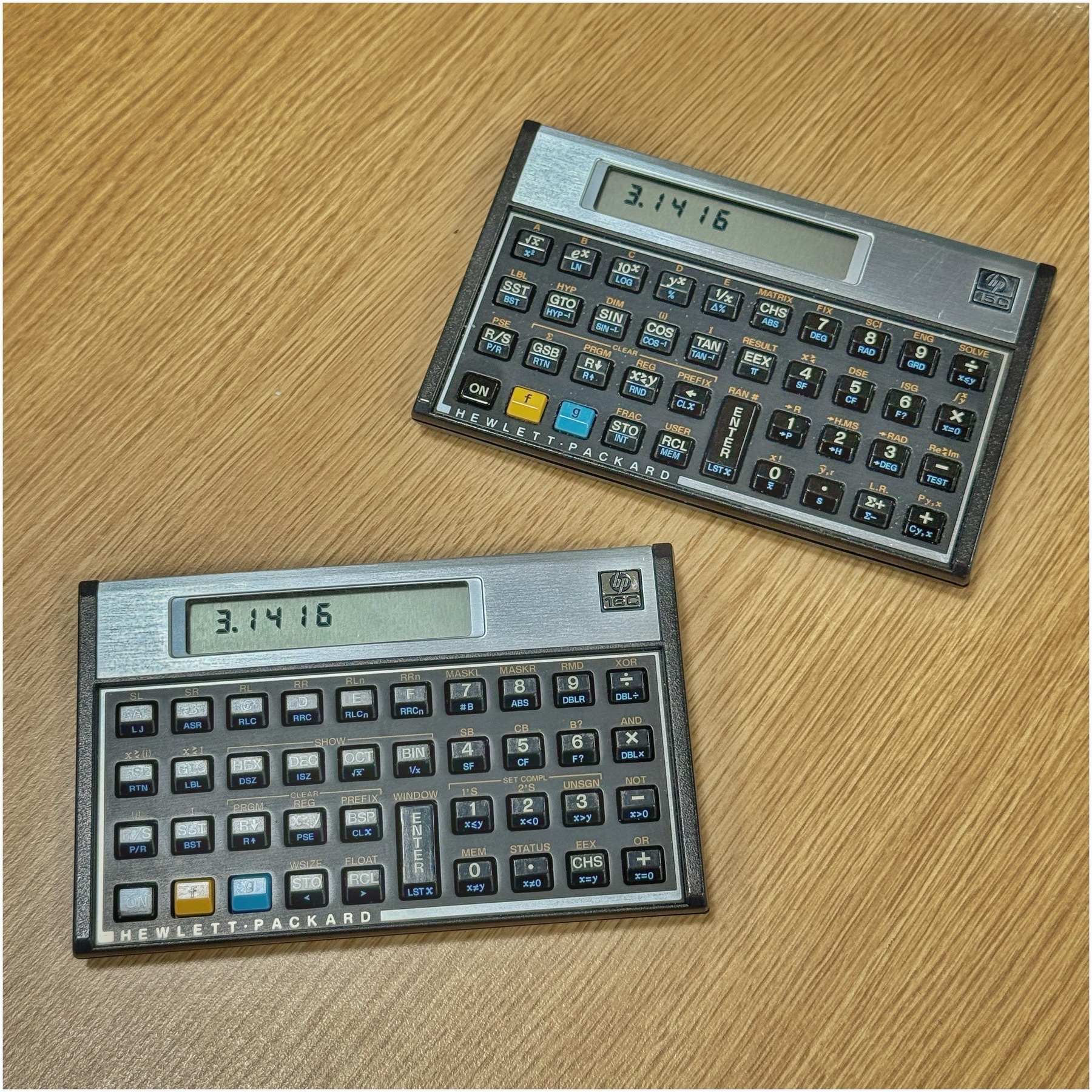Two vintage Hewlett-Packard calculators. 