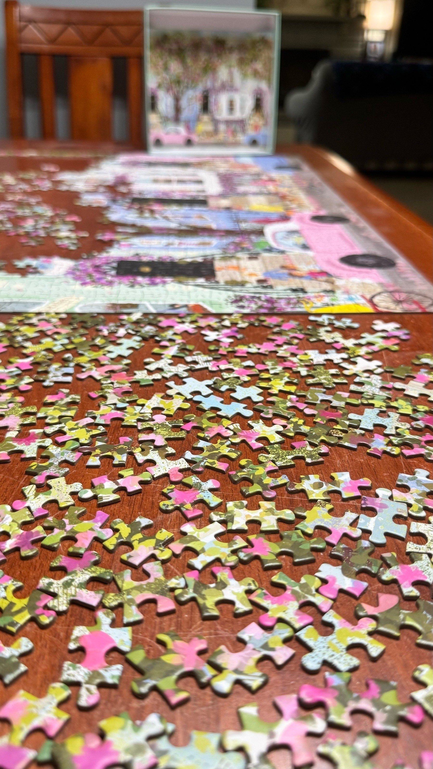 Dozens of puzzle pieces with blossoms and leaves that have been on our kitchen table for too long. 