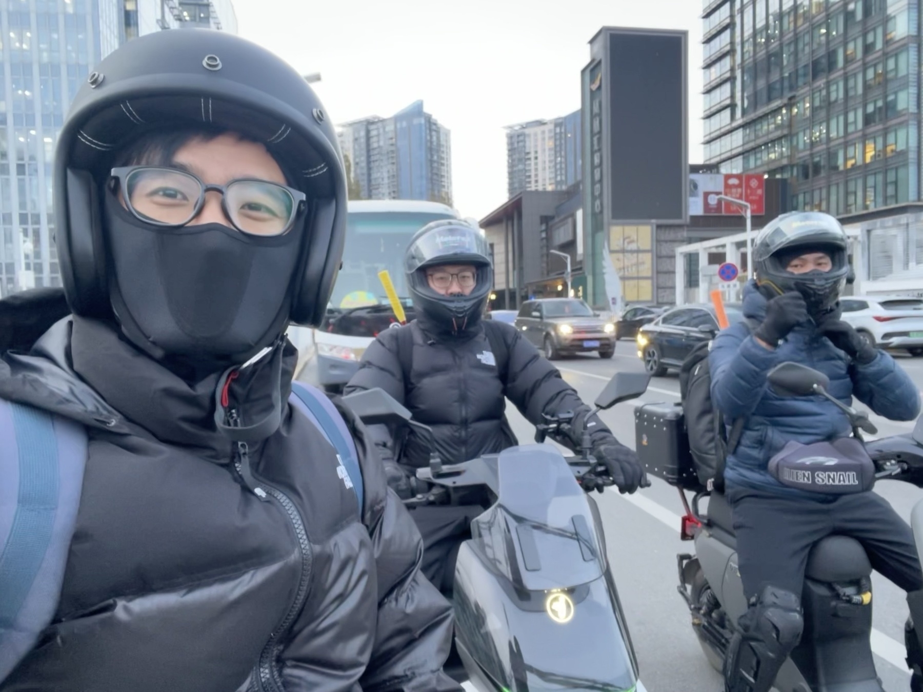 The three of us rode an e-bike to play badminton