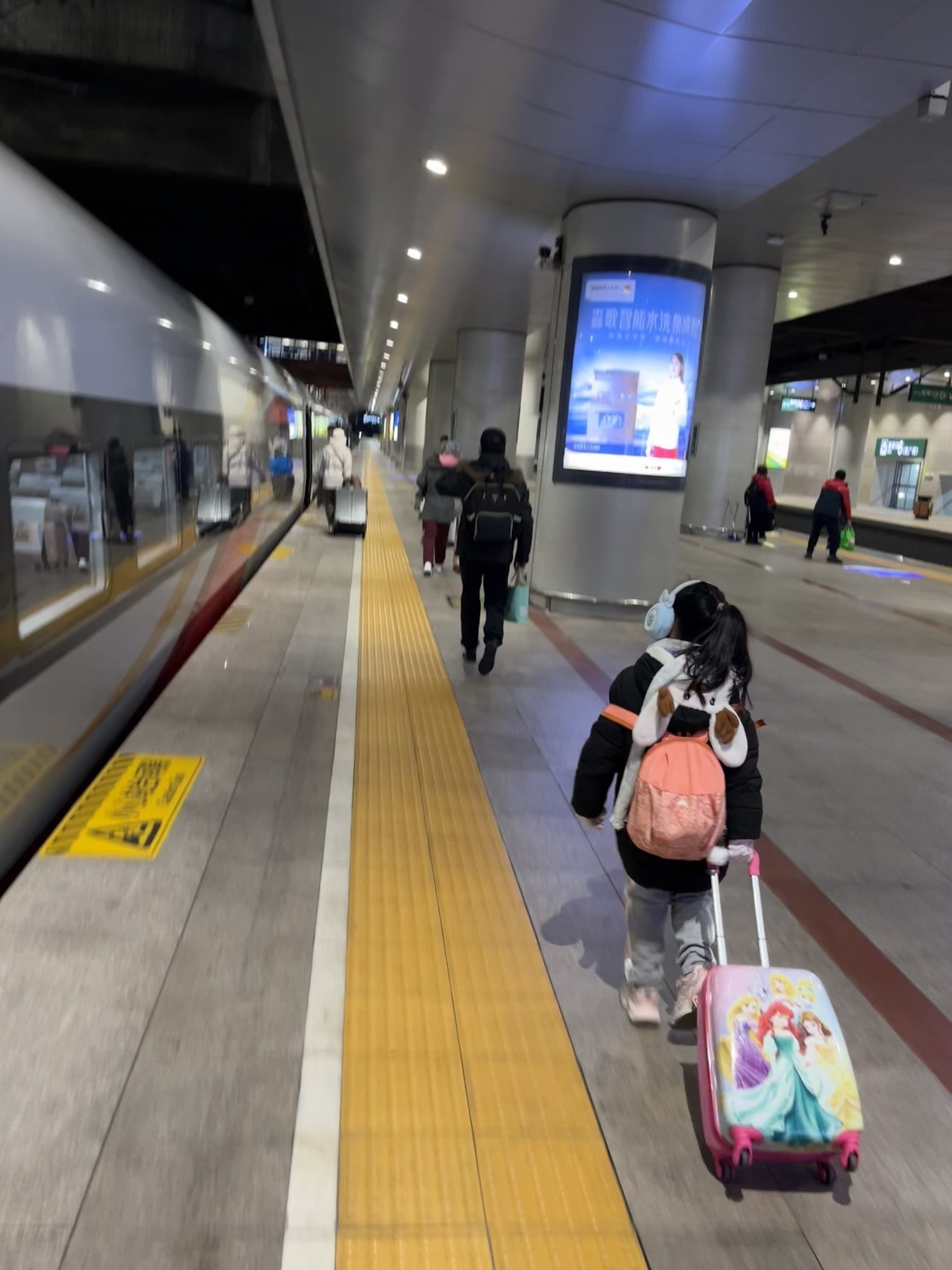 Hamer carried her backpack and pulled her suitcase by herself to catch the train last Saturday.