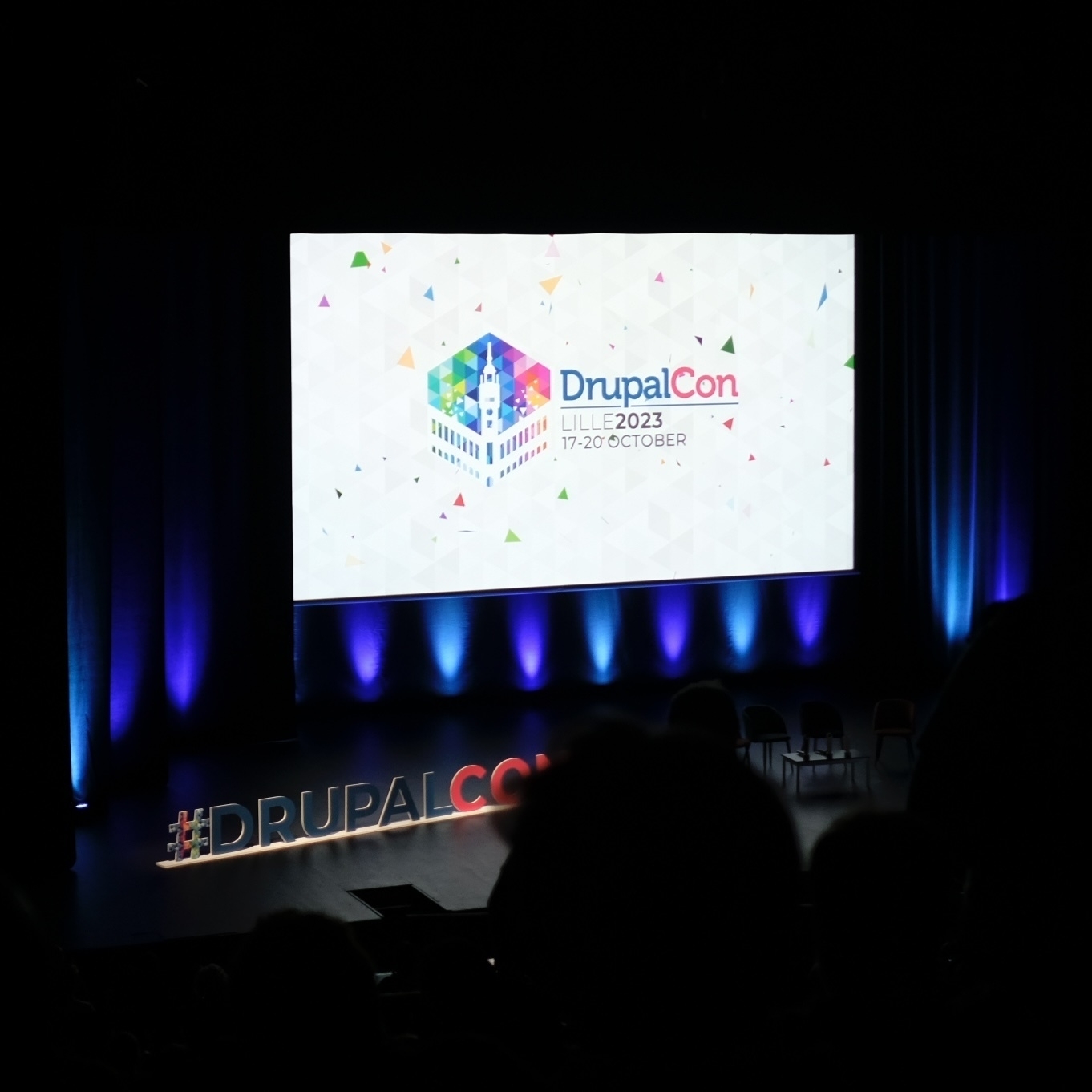 The Drupalcon stage with the opening slide on the screen