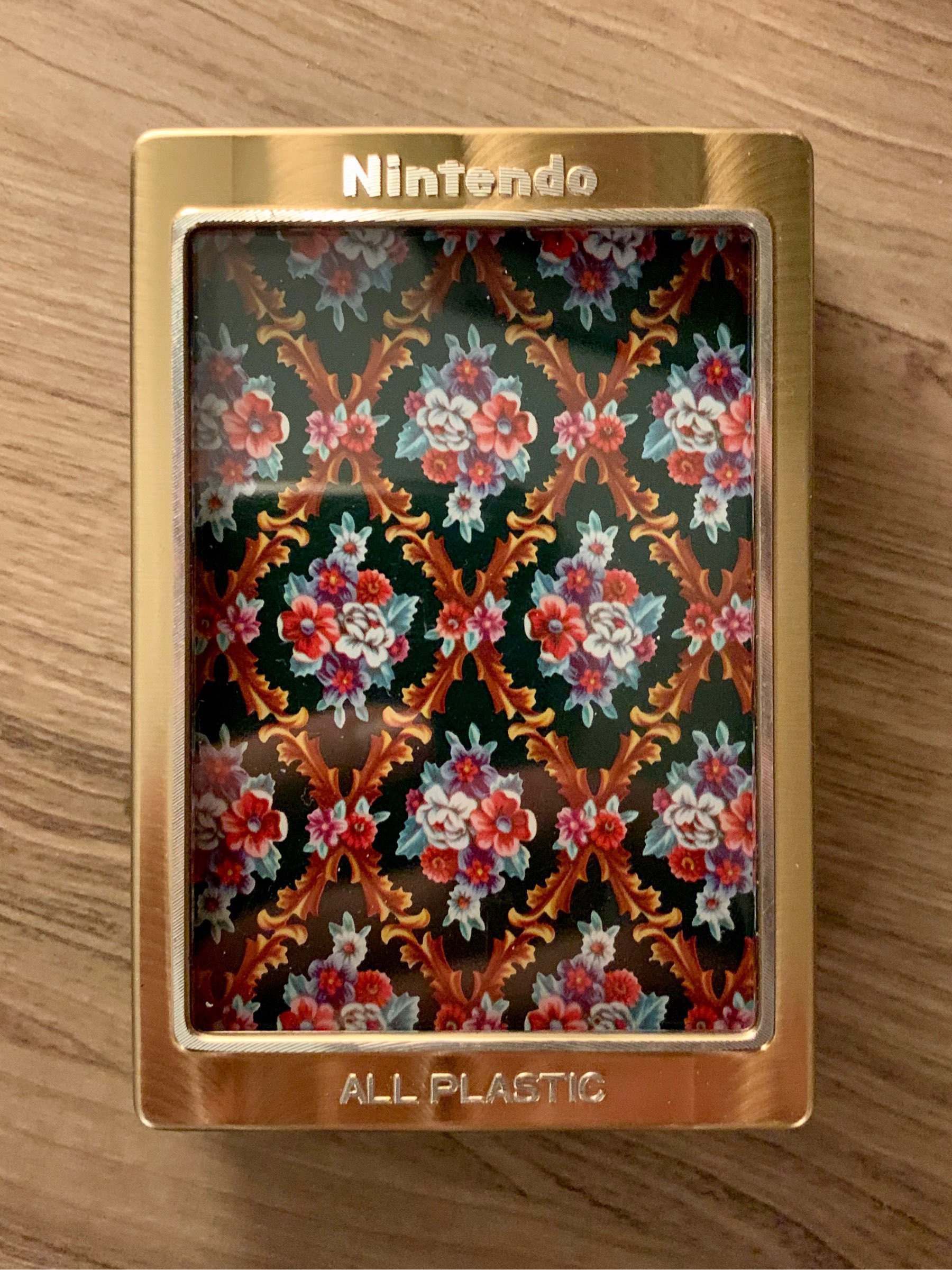Playing cards in a Nintendo-branded plastic box