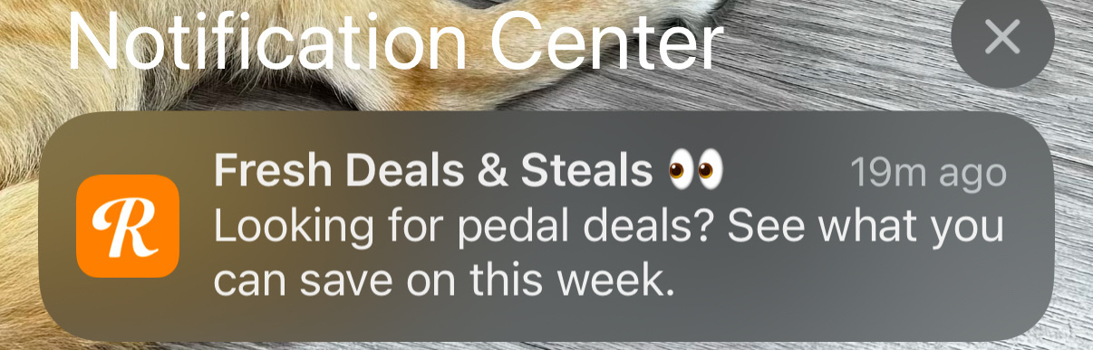 A notification from "Fresh Deals & Steals" offers pedal deals and savings for the week.