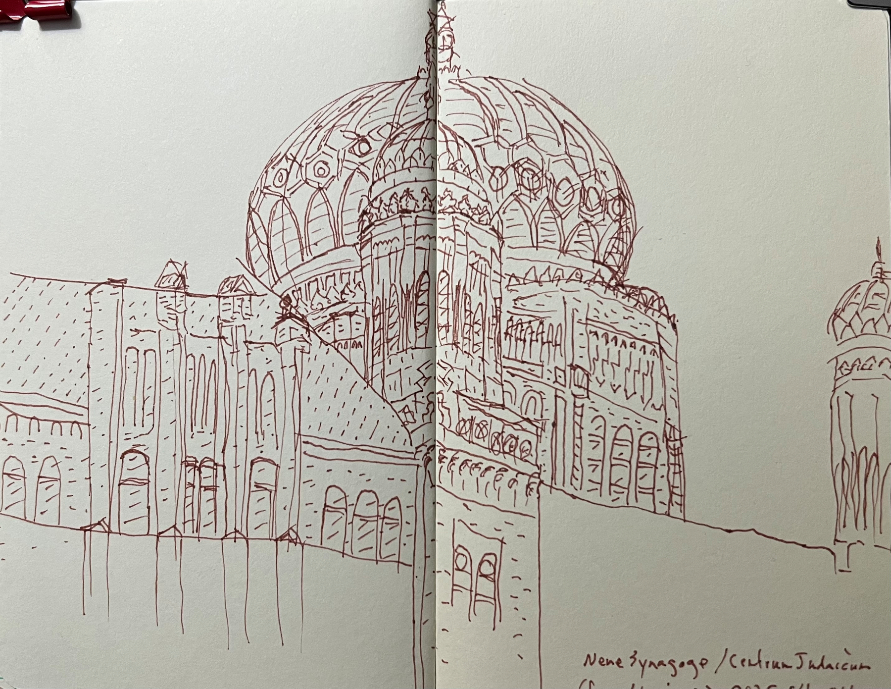 A detailed sketch in brown lines of a domed synagogue, with intricate architectural elements.