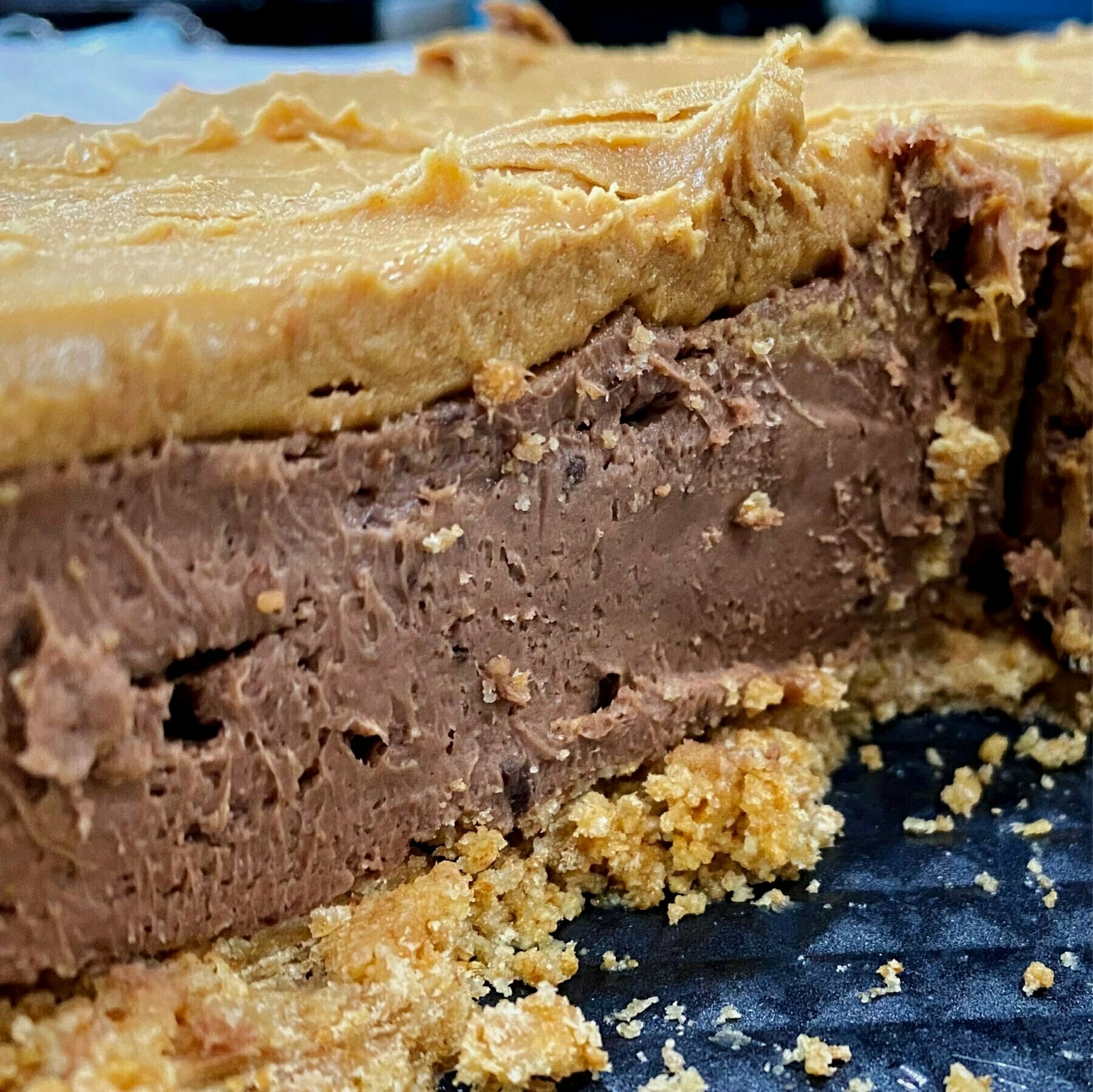 sliced chocolate peanut butter cheesecake