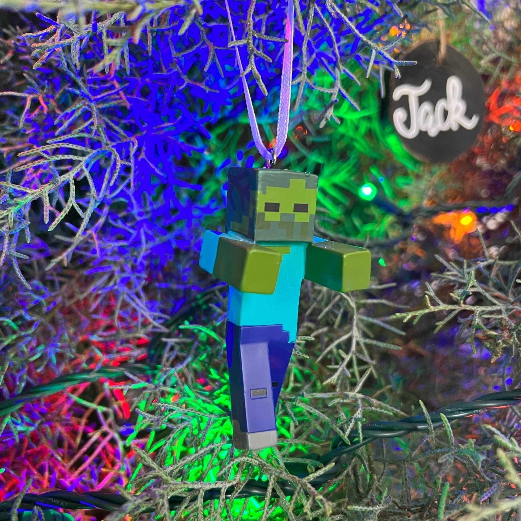 Minecraft ornament on a Christmas tree