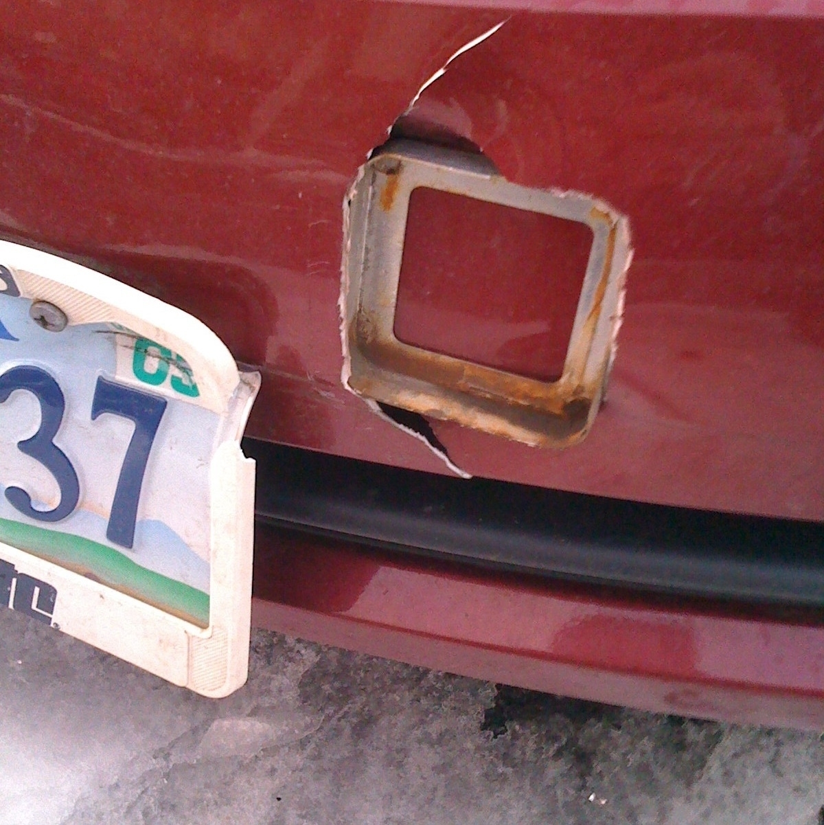 damaged front car bumper