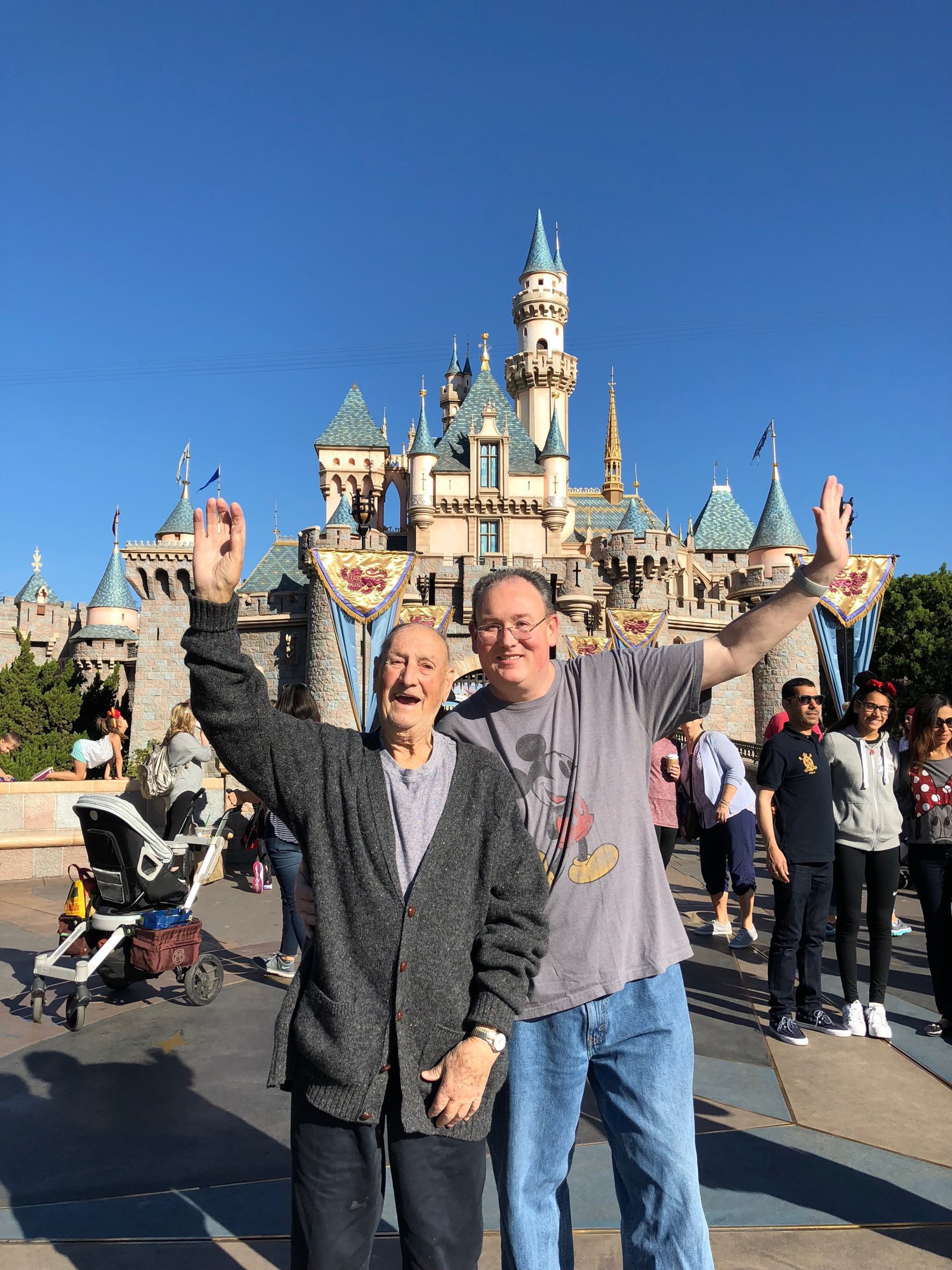 My Dad and I in front of Sleeping Beauty's Castle at Disneyland