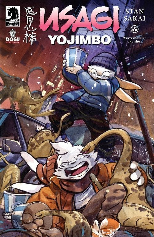 Auto-generated description: A rabbit character wearing a beanie and scarf is playfully throwing paint on another rabbit who is laughing amidst a chaotic scene with several small dinosaur-like creatures and overturned buckets.