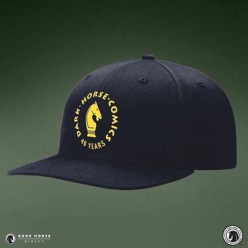 Auto-generated description: A black baseball cap features a yellow emblem with a horse head and the text DARK HORSE COMICS 40 YEARS.
