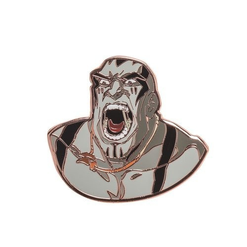 Auto-generated description: A fierce, muscular character with black markings on his face is shown shouting with his mouth wide open.
