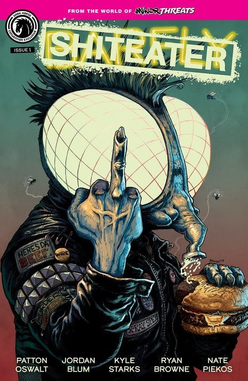 Auto-generated description: A punk-styled humanoid fly character wearing a studded jacket shows an obscene hand gesture with one hand while holding a sandwich in the other, with the title SHITEATER prominently displayed above.