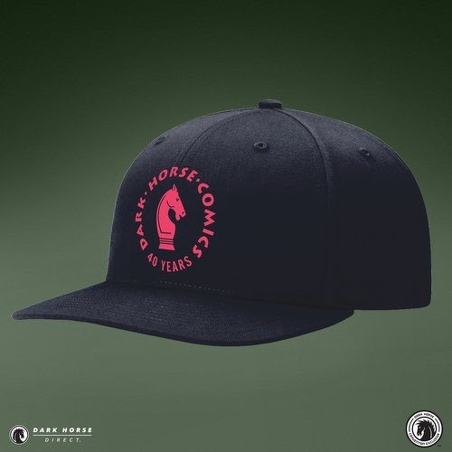 Auto-generated description: A black baseball cap features the text Dark Horse Comics 40 Years with a stylized horse head logo in red.