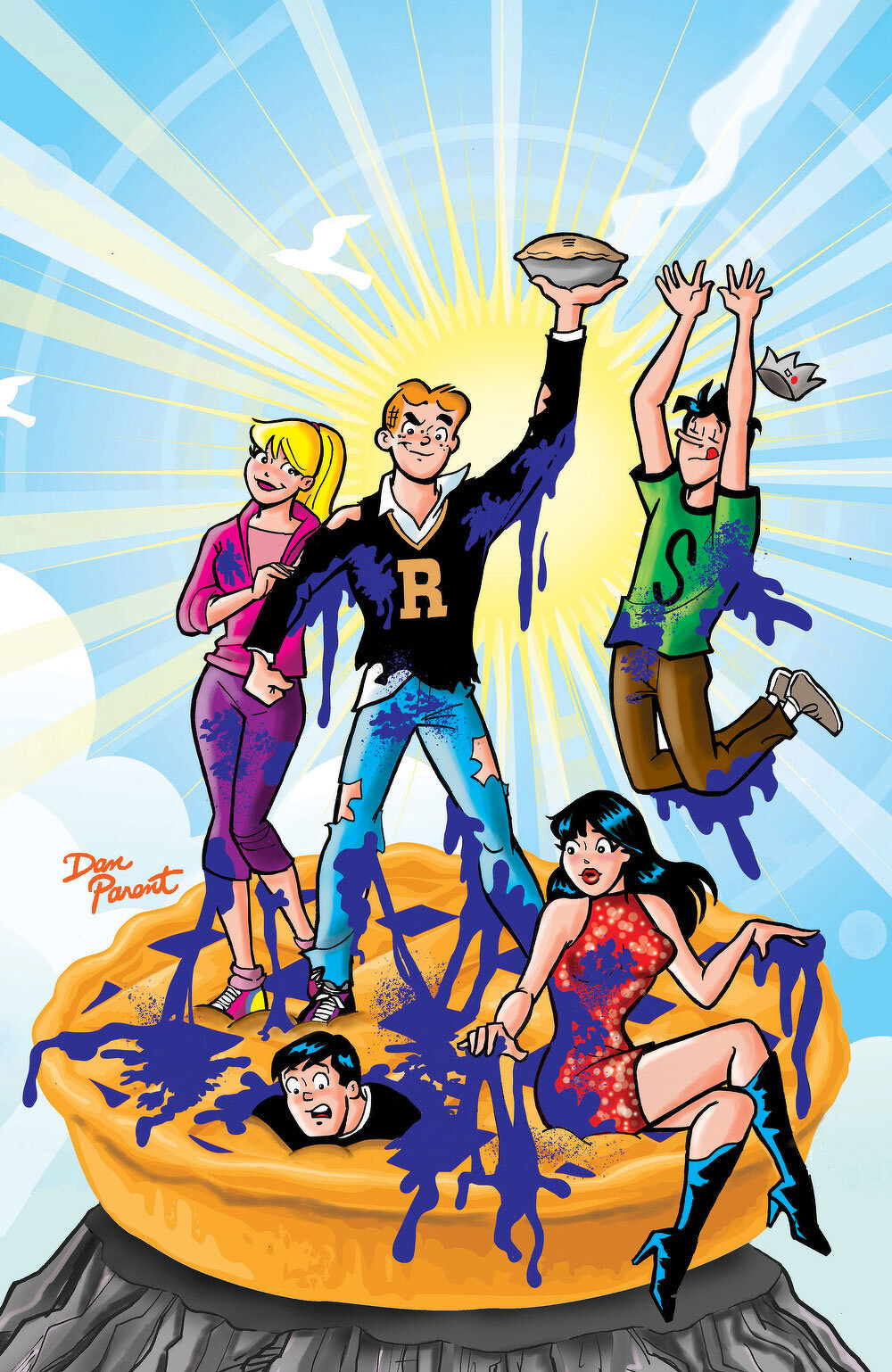 Teenagers are standing and jumping on top of a large pie with purple filling, with one holding a slice.