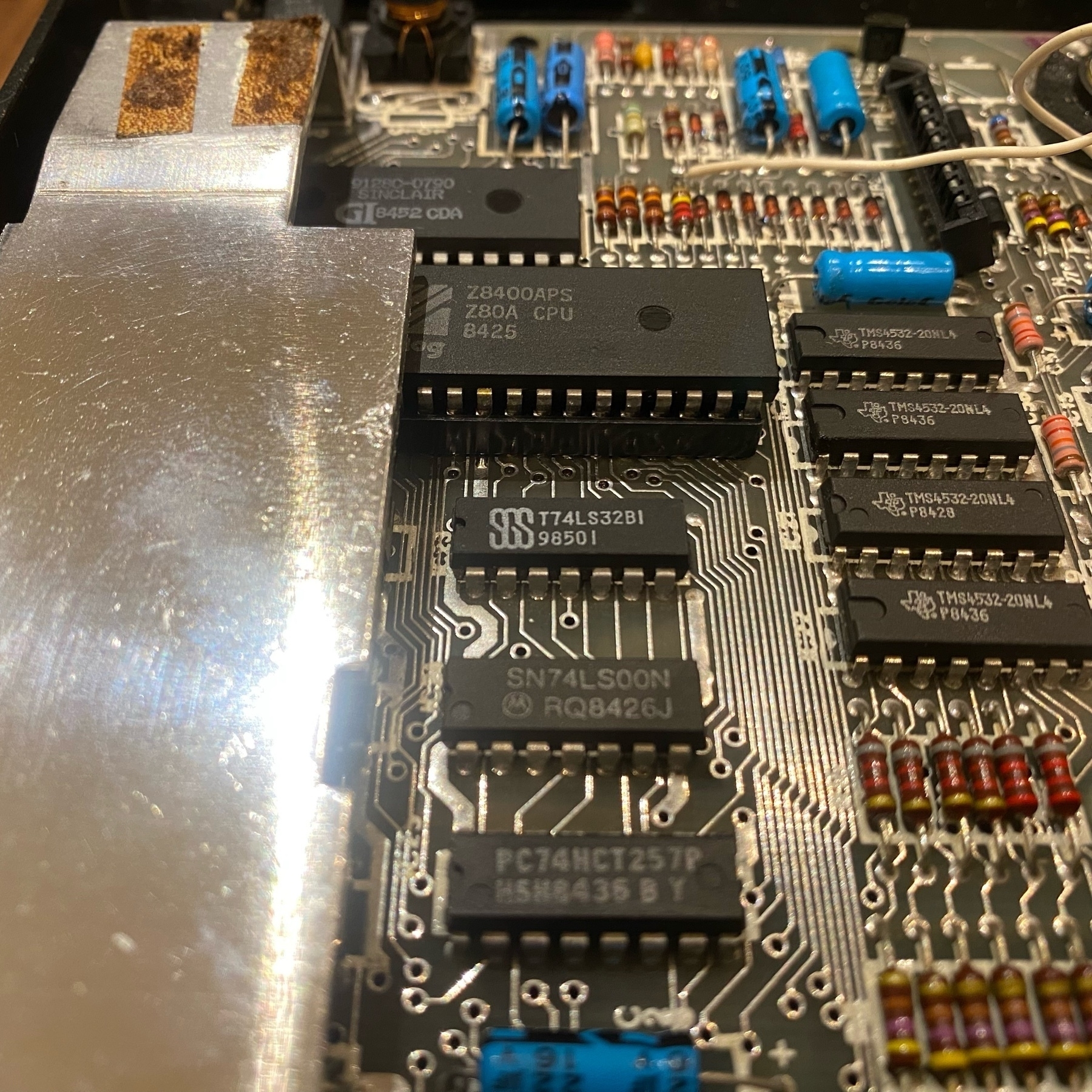 ZX Spectrum circuit board with a very shiny heat-sink and a Z80A CPU with the date code of 8425