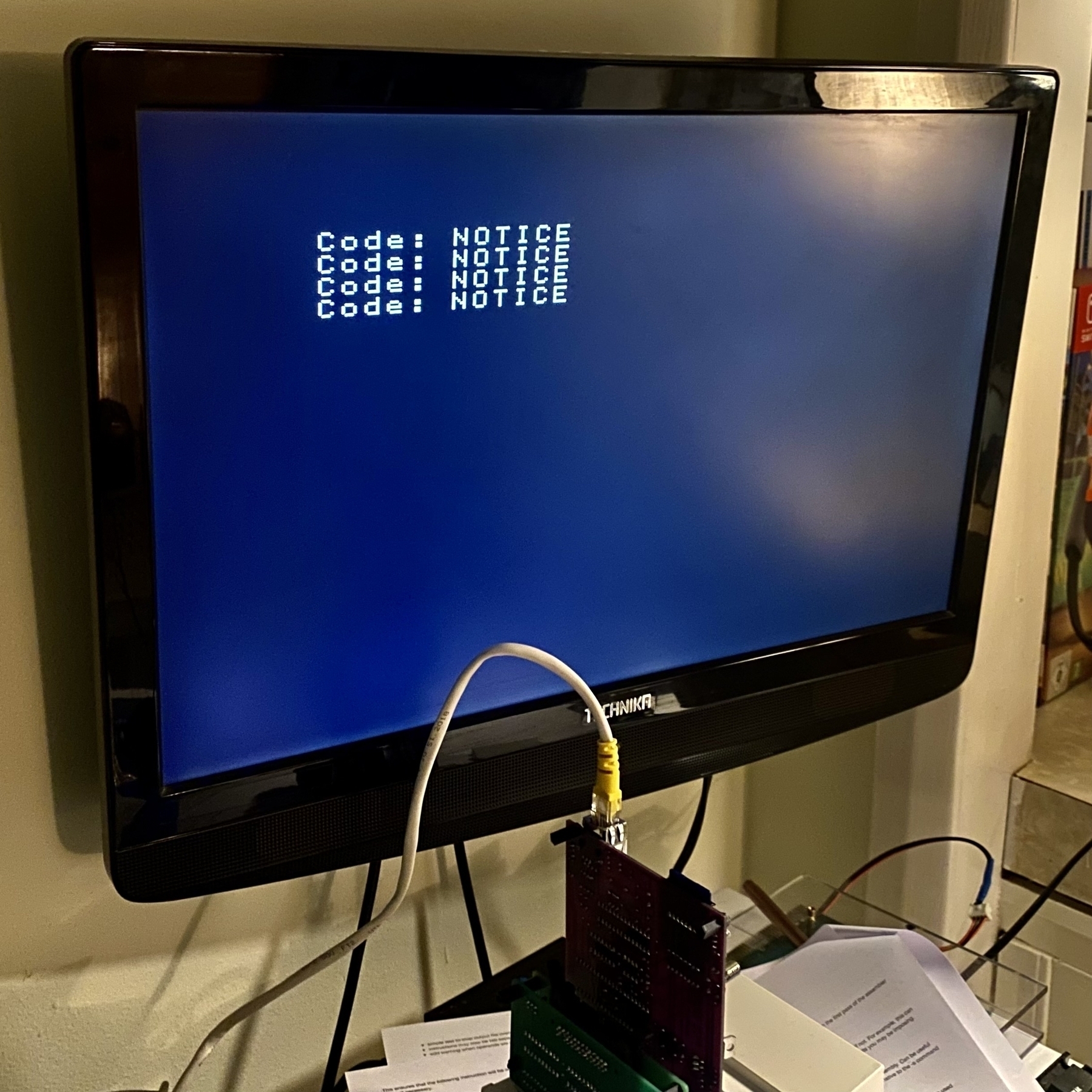 SAM Coupé display showing the text “Code: NOTICE” implying it’s (trying to) load a code block.