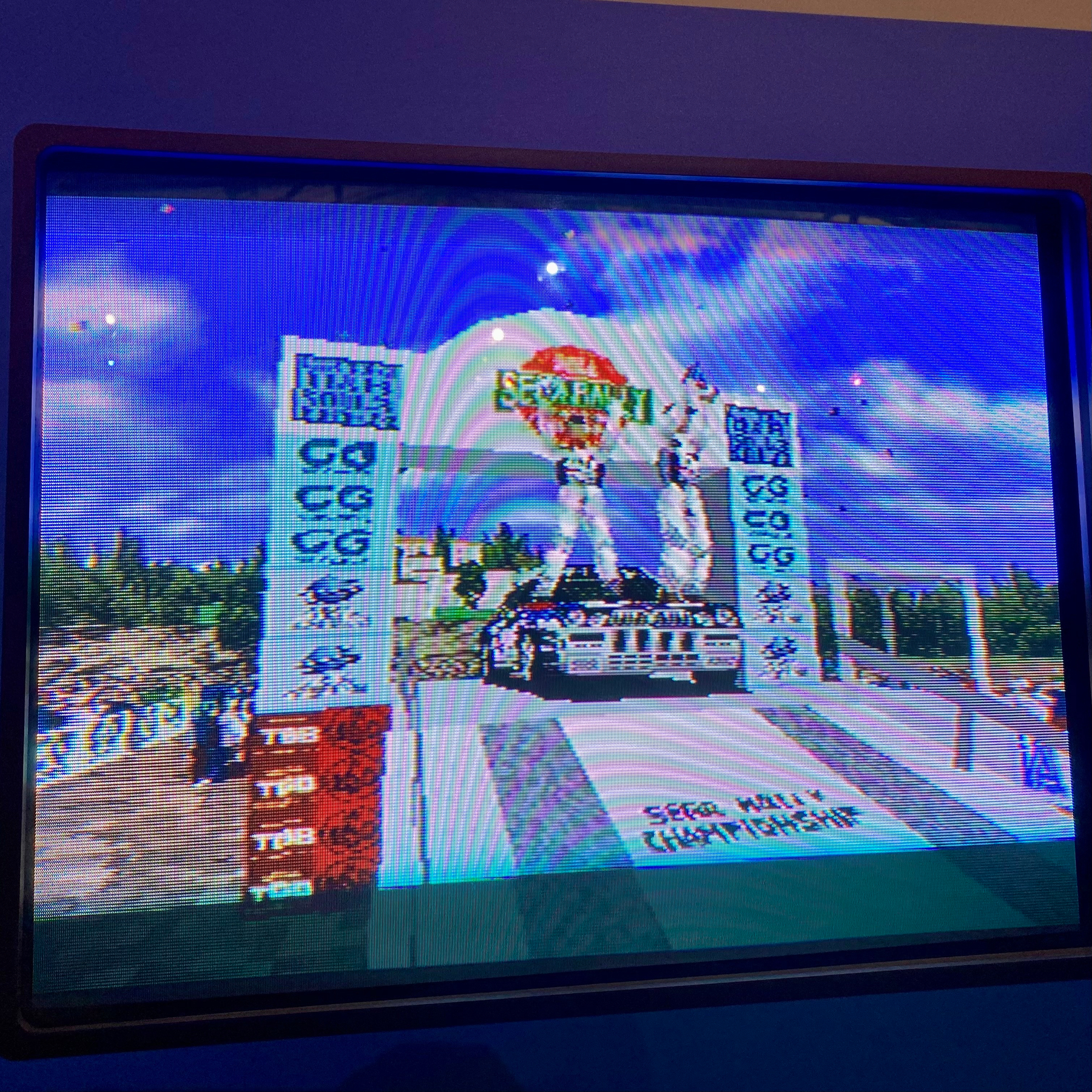 Sega Rally ending cutscene/credits. Drivers celebrate standing on the car bonnet. 