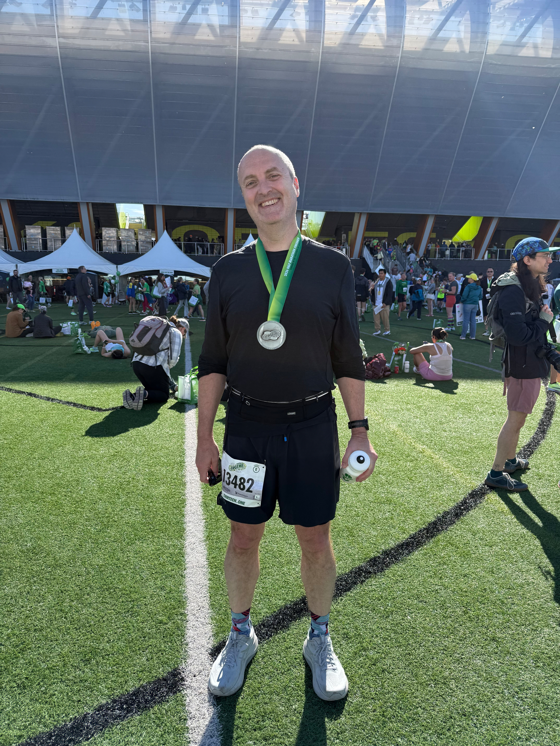 A map displays a route marked in blue with numbered waypoints through Eugene, Oregon, highlighting areas such as the University of Oregon and surrounding neighborhoods.