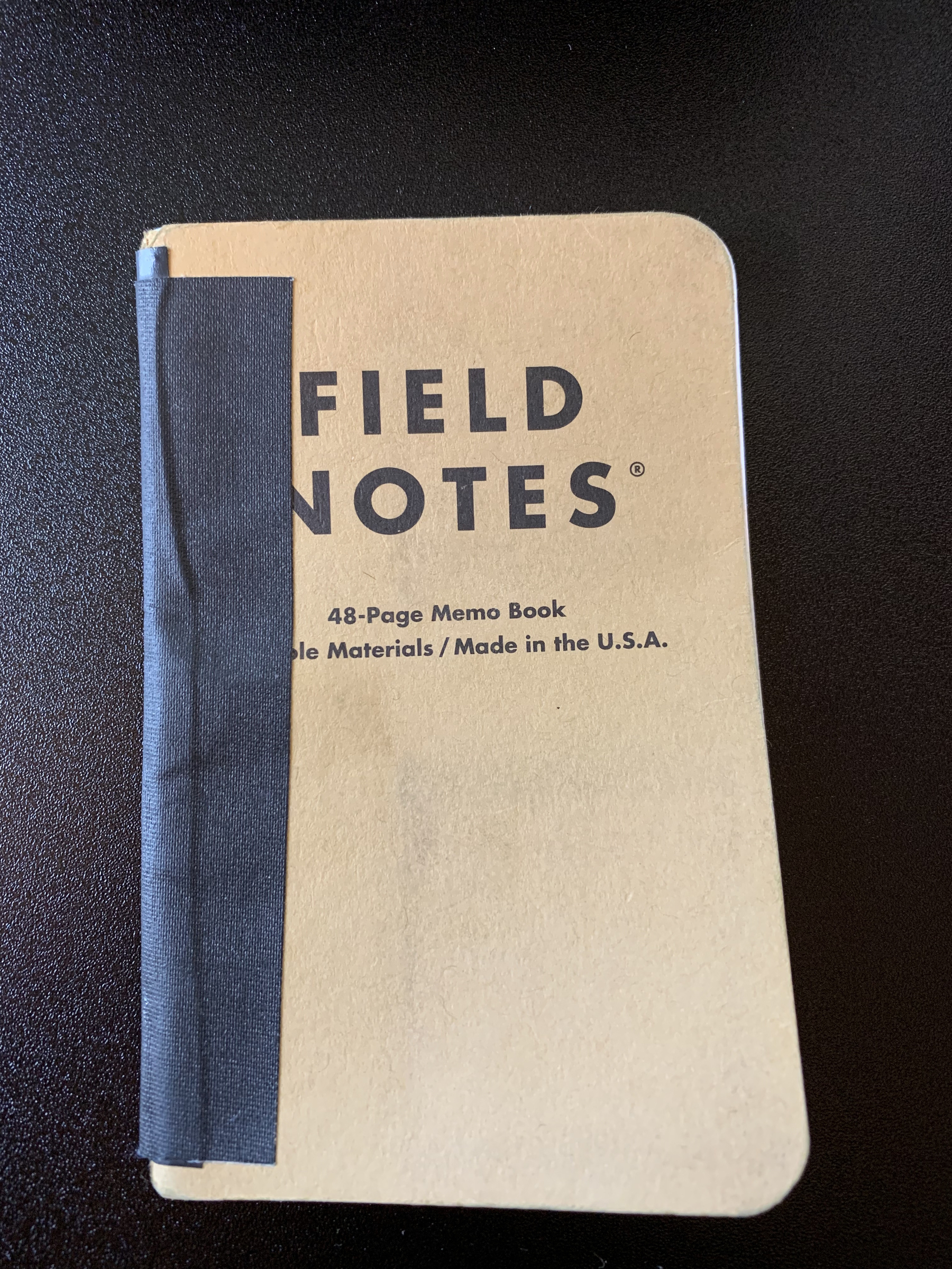 Field Notes Held together by Electrical Tape
