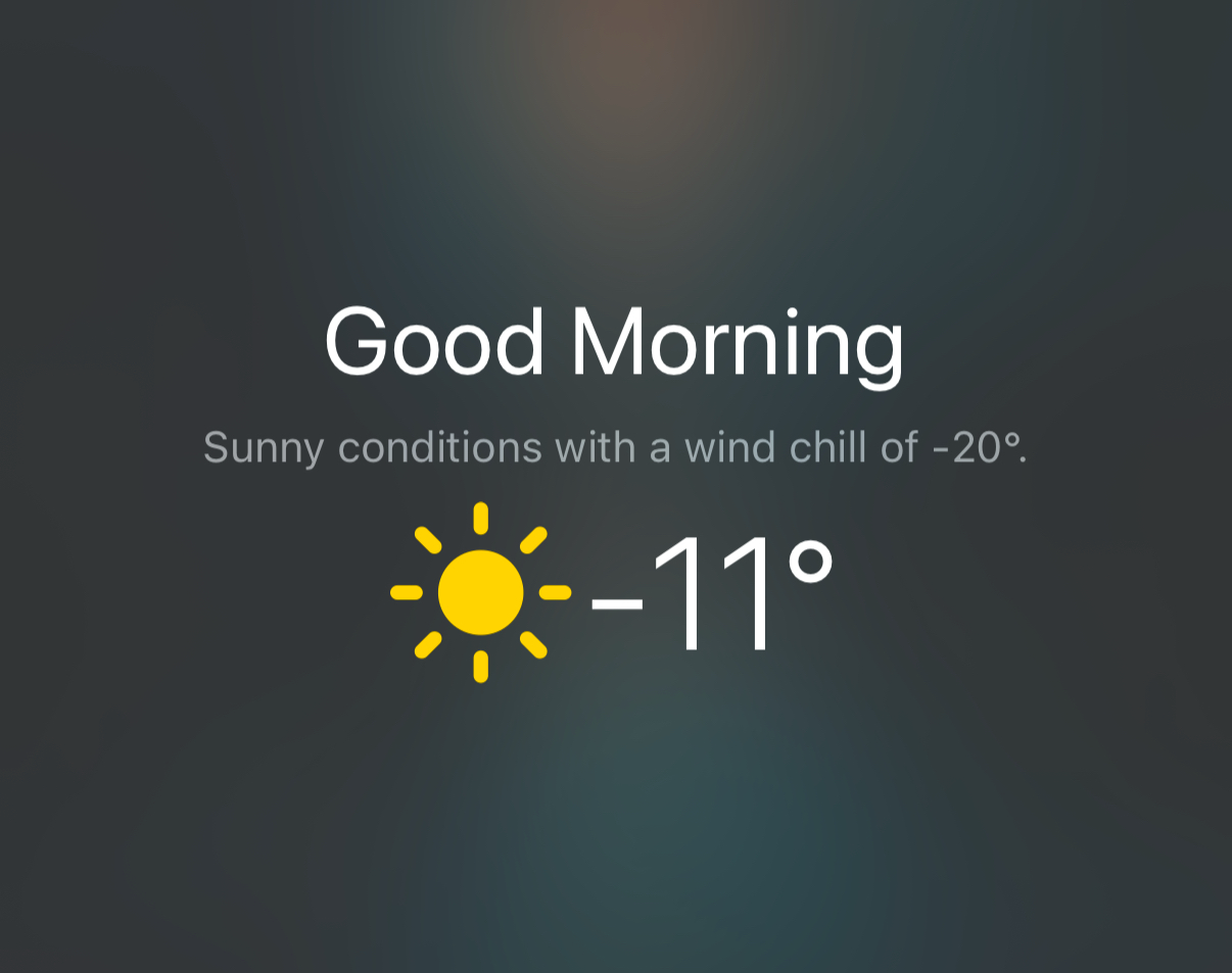 Weather display shows a sun icon indicating sunny conditions, with text reading “Good Morning,” temperature at -11°C, and a wind chill of -20°C, on a dark gradient background.