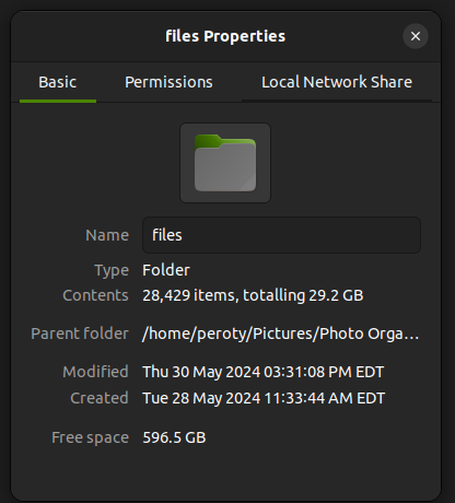 Screenshot of a folder showing 28,429 items totaling 29.2 GB of duplicate photos.